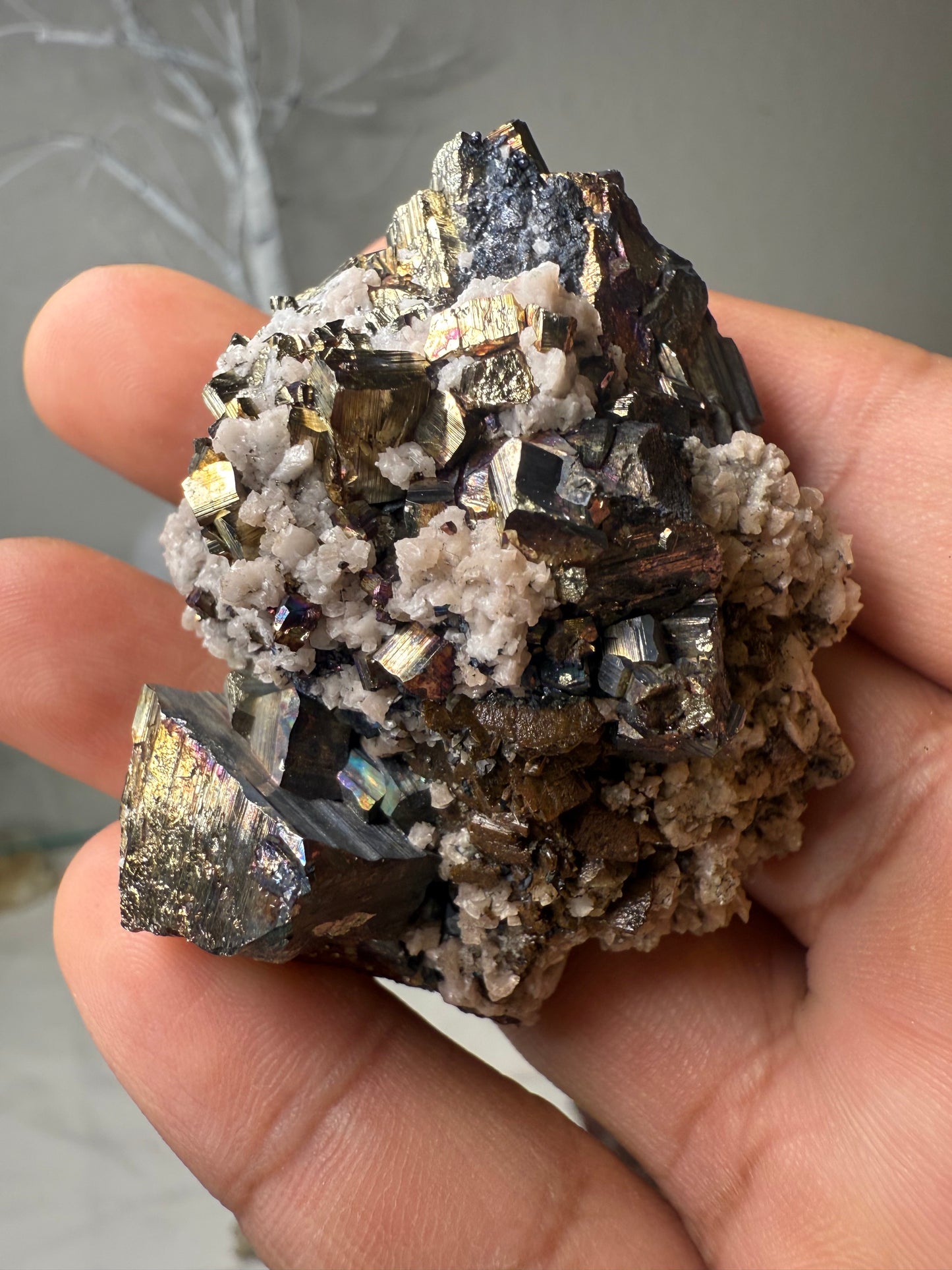 Iridescent pyrite with calcite